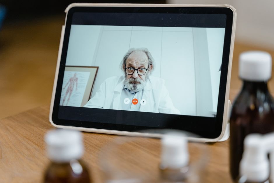 Patient using one of the best telehealth platforms for weight loss on a video call